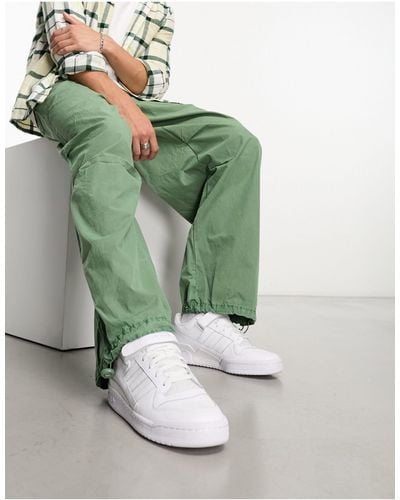 River Island Pantaloni parachute kaki - Verde