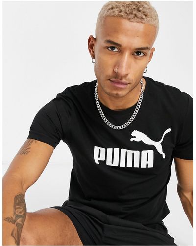 PUMA – essentials – t-shirt mit großem logo - Schwarz