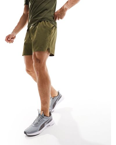 PUMA Training evolve - pantaloncini kaki - Verde