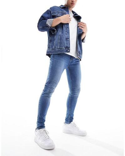 ASOS – hautenge jeans mit power-stretch - Blau