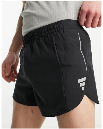 adidas Originals Adidas running – own the run – shorts mit schlitz - Schwarz