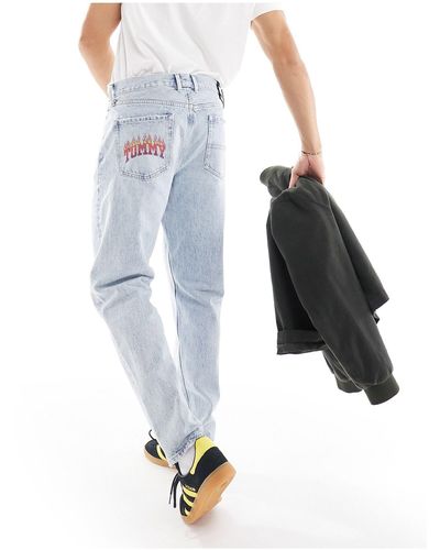 Tommy Hilfiger – isaac – lässig geschnittene, schmal zulaufende jeans - Blau