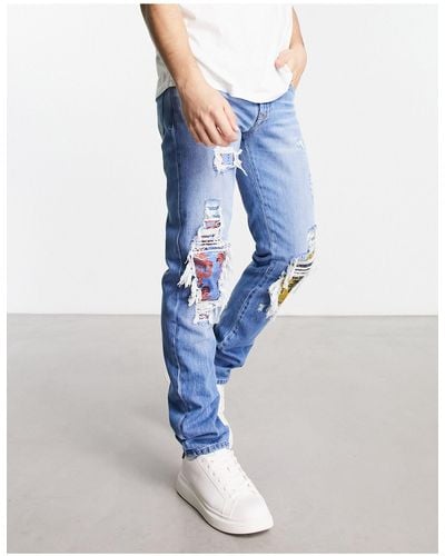 Versace Jeans con toppe e strappi - Blu