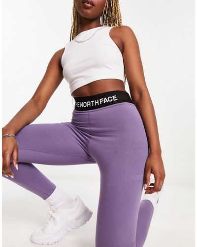 The North Face Training High Waisted leggings in pink Exclusive at ASOS