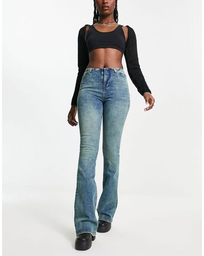 Reclaimed (vintage) Skinny Flared Jeans Met Stretch Zonder Tailleband - Blauw