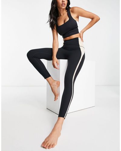 Nike Nike - Yoga Luxe - Dri-fit 7/8e legging Met Hoge Taille En Ingezette Vlakken - Zwart