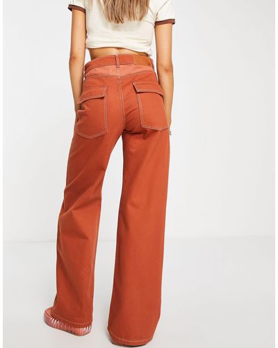 Reclaimed Vintage Inspired '99 flare jeans in red