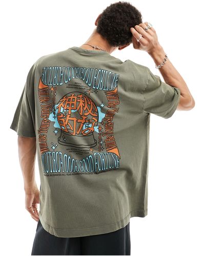 ASOS T-shirt oversize pesante color slavato con stampa celestiale sul retro - Grigio