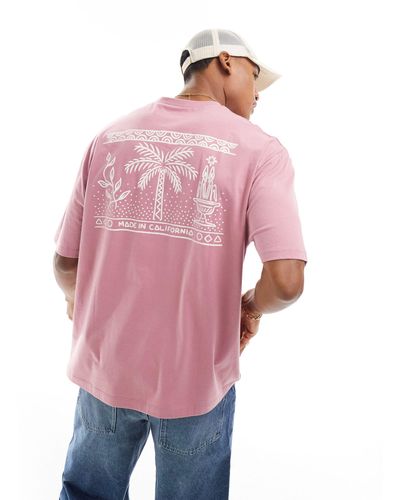 ASOS Camiseta extragrande con estampado escénico en la espalda - Rosa