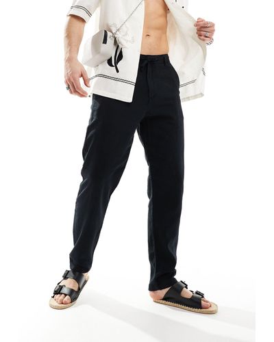 SELECTED Pantalon ajusté coupe fuselée en lin - Noir