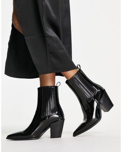 Truffle Collection Bottines pointues vernies style santiags - Noir