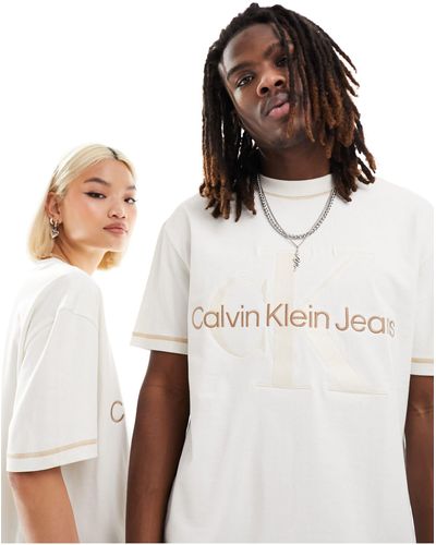Calvin Klein T-shirt unisex color avorio con monogramma del logo - Bianco