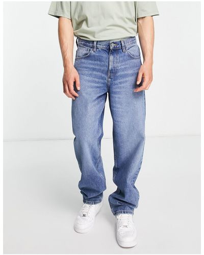 ASOS Ruimvallende Jeans Met Middene Wasing - Blauw