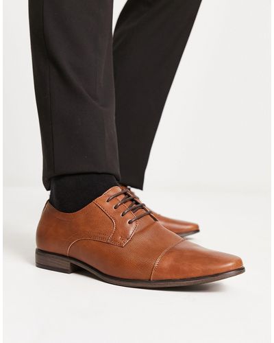 River Island Zapatos derby marrones con diseño grabado y puntera en contraste - Marrón
