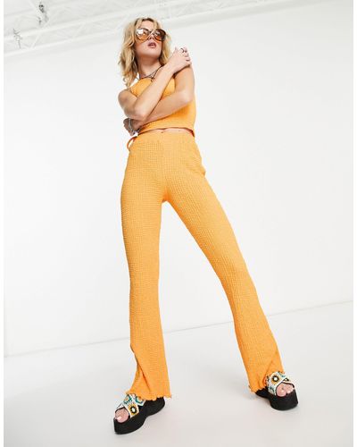 Reclaimed (vintage) Inspired - pantaloni dritti plissé arancioni - Arancione
