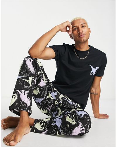 ASOS Lounge-pyjamaset Met T-shirt En Broek Met Dinosaurusprint - Zwart