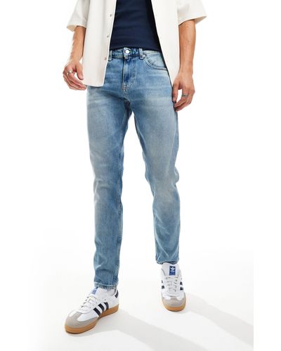 Tommy Hilfiger – schmal zulaufende jeans - Blau