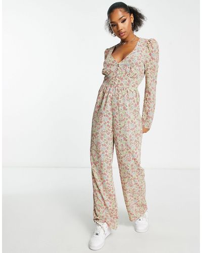 Monki Tuta jumpsuit a maniche lunghe con stampa floreale - Bianco