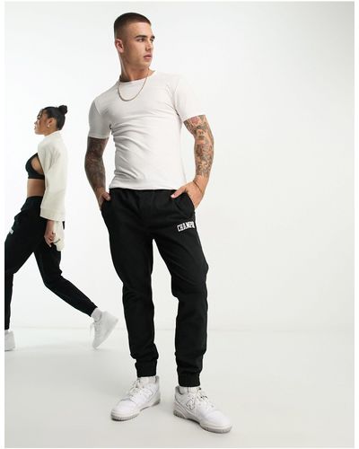 Champion Joggers s unisex con logo pequeño - Blanco