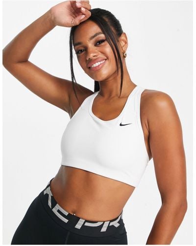 Nike – sport-bh mit mittlerer stützfunktion und swoosh-logo - Weiß
