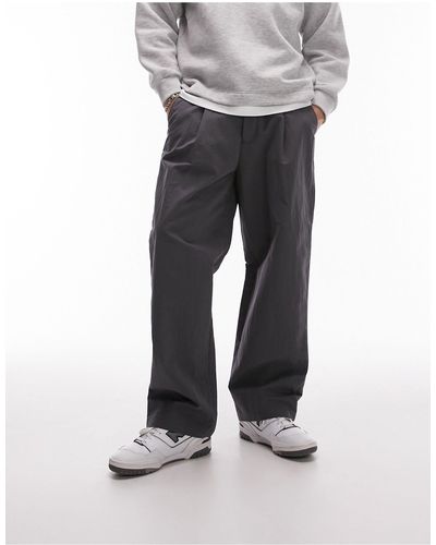 TOPMAN Pantaloni premium a vita alta con fondo ampio color antracite - Grigio