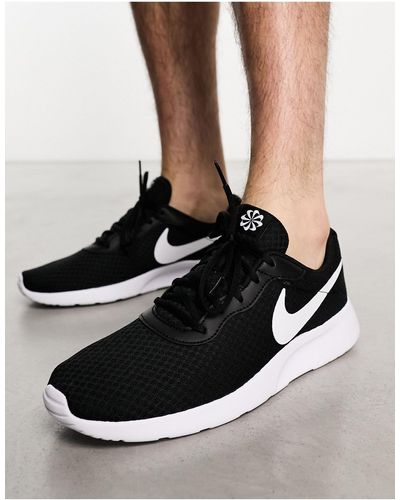 Nike Tanjun Sneakers for Men Up to 65 off Lyst