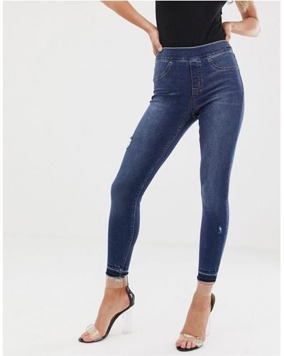 Spanx Jeans skinny push-up modellanti effetto invecchiato - Blu