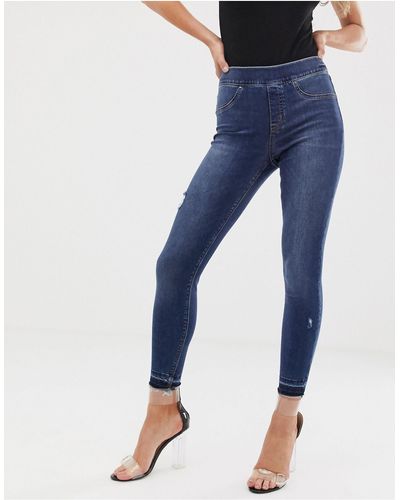 Spanx Vormende En Liftende Distressed Skinny Jeans - Blauw