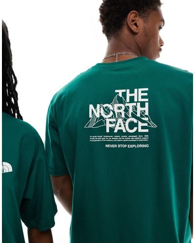 The North Face T-shirt oversize scuro con stampa di montagne sulla schiena - Verde