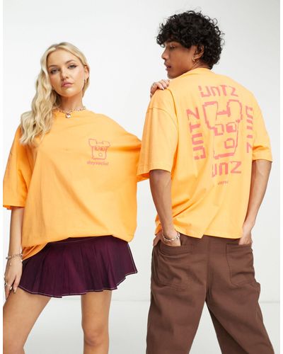 ASOS Asos - daysocial - t-shirt oversize unisexe avec imprimé graphique et broderie - Orange