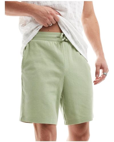 ASOS – schmal geschnittene shorts - Grün