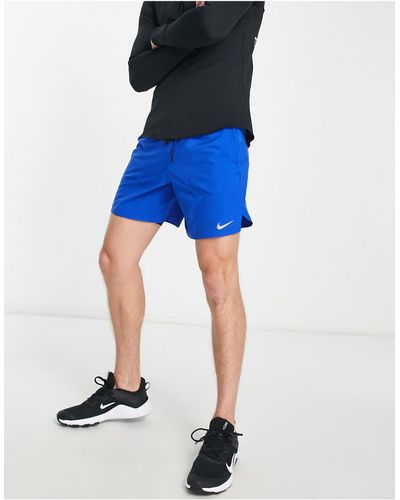 Nike Stride - short 2-en-1 7 pouces - Bleu
