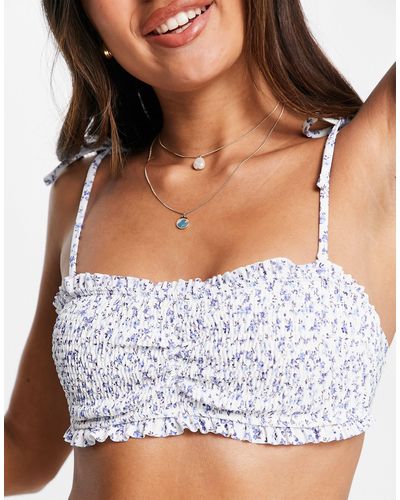 Hollister Top bikini a fascia blu a fiori con volant - Bianco