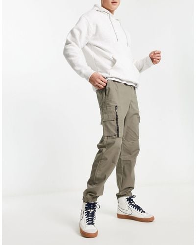 Pull&Bear Pantalon cargo en tissu ripstop avec poches contrastantes - kaki - Blanc
