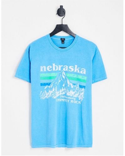 River Island T-shirt azzurra con stampa del nebraska - Blu