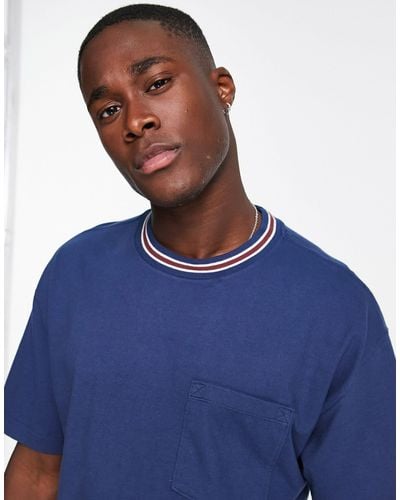Abercrombie & Fitch Camiseta extragrande con ribetes en el cuello y bolsillo - Azul