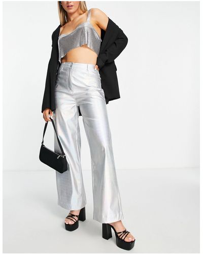 Annorlunda Pantaloni a fondo ampio color metallizzato - Bianco