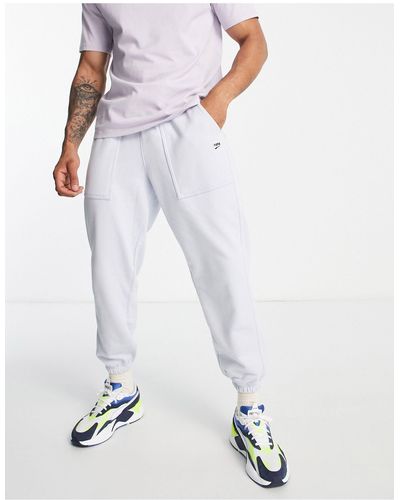 PUMA Downtown - jogger avec poche à damier - pâle - Blanc