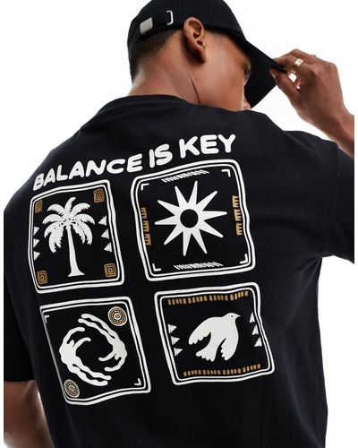 SELECTED T-shirt oversize nera con stampa "balance" con palme sul retro - Nero
