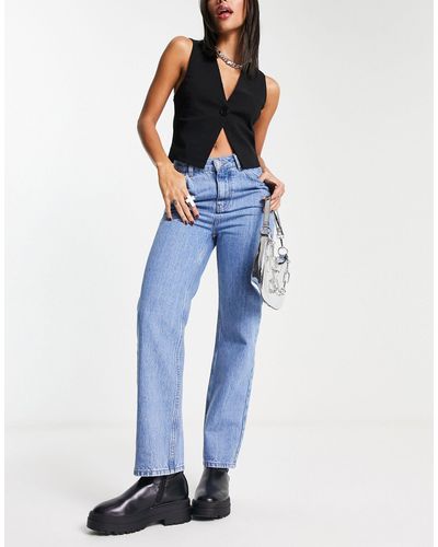 Reclaimed (vintage) Jean slim taille haute style années 90 - délavage vieilli - Bleu