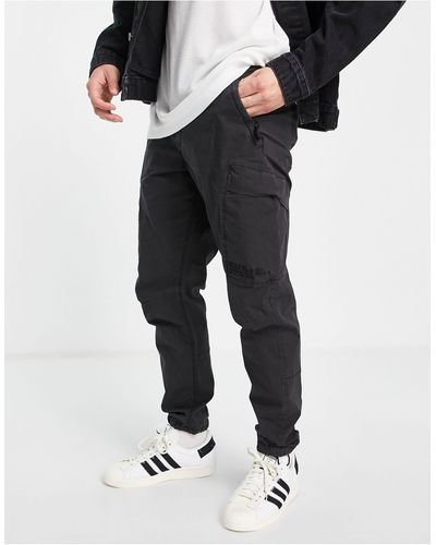 River island tapered outlet cargo trousers in black