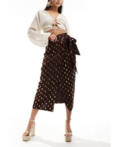 Never Fully Dressed Jaspre - jupe mi-longue à imprimé moucheté doré - chocolat - Marron