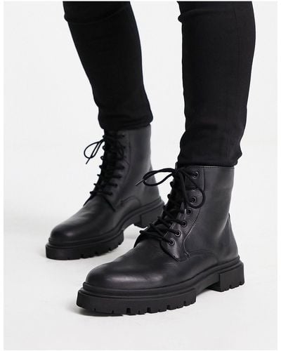 Schuh Botas negras con suela gruesa y cordones - Negro