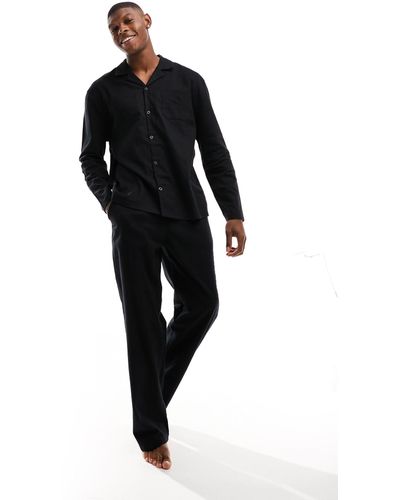 ASOS Ensemble pyjama en flanelle avec chemise à manches longues et pantalon - Noir