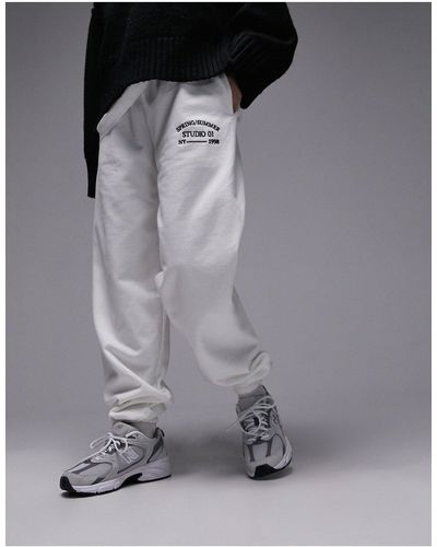 TOPSHOP Studio 01 - joggers oversize con fondo elasticizzato bianchi lavaggio vintage con ricamo - Nero