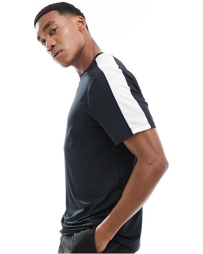 ASOS 4505 Camiseta negra deportiva con raya lateral en contraste - Azul