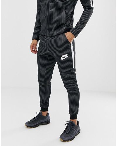 Nike Pinstripe Joggers In Black Bq0676-010