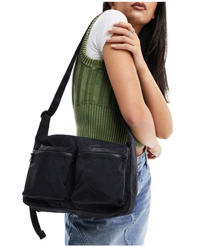 BAGGU – mittelgroße umhängetasche mit cargotaschen aus nylon - Schwarz
