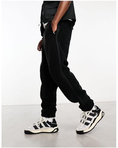 adidas Originals Premium Essentials Teddy Fleece joggers - Black
