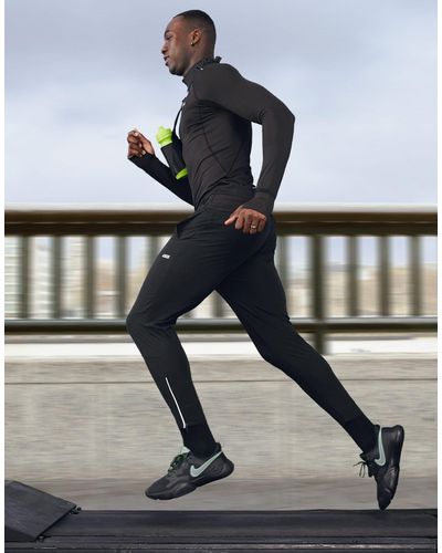 ASOS 4505 – enge lauf-jogginghose aus webstoff mit karottenschnitt und reflektierenden reißverschlüssen - Schwarz